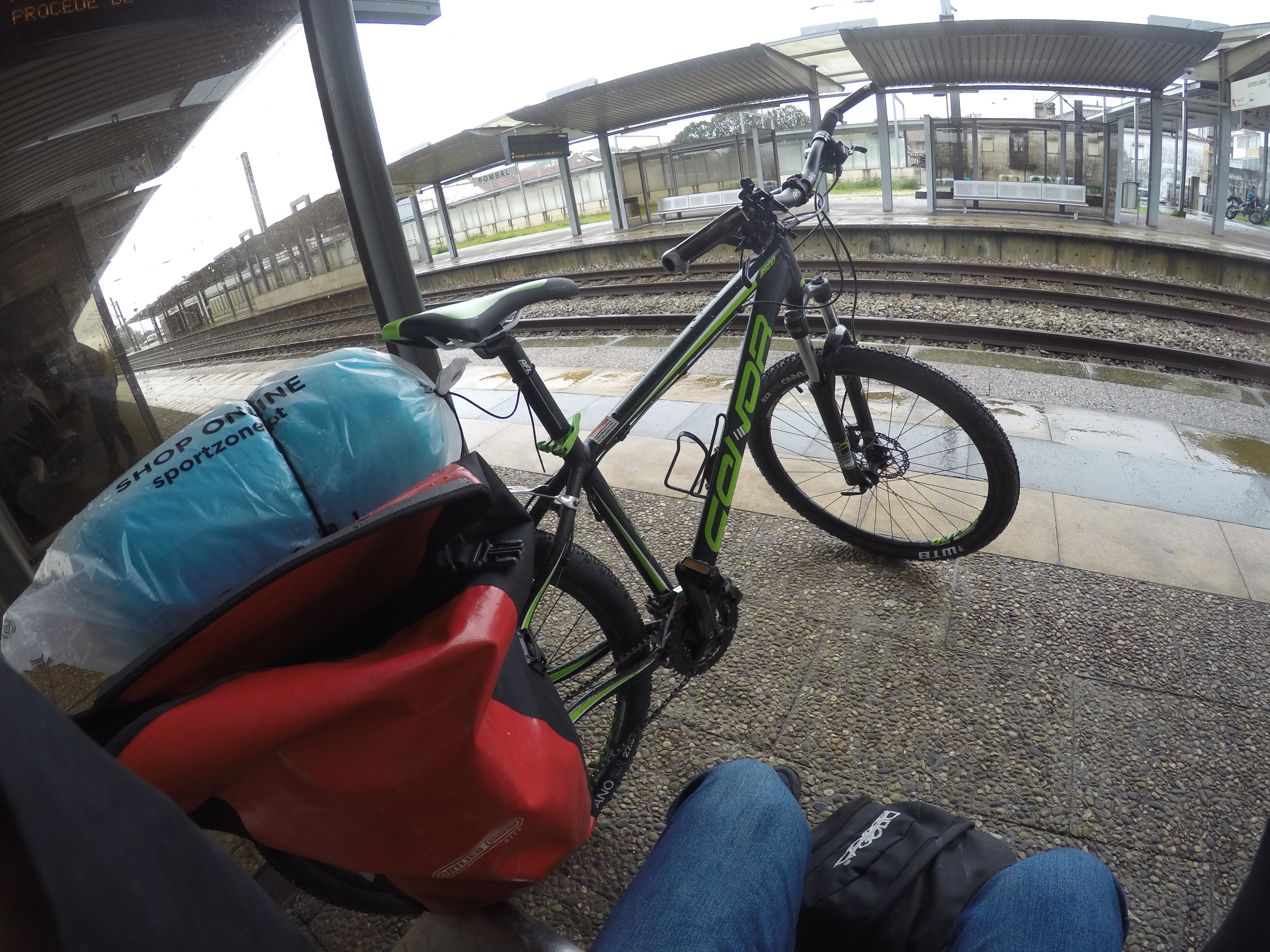 A bike in front of the train station in Pombal